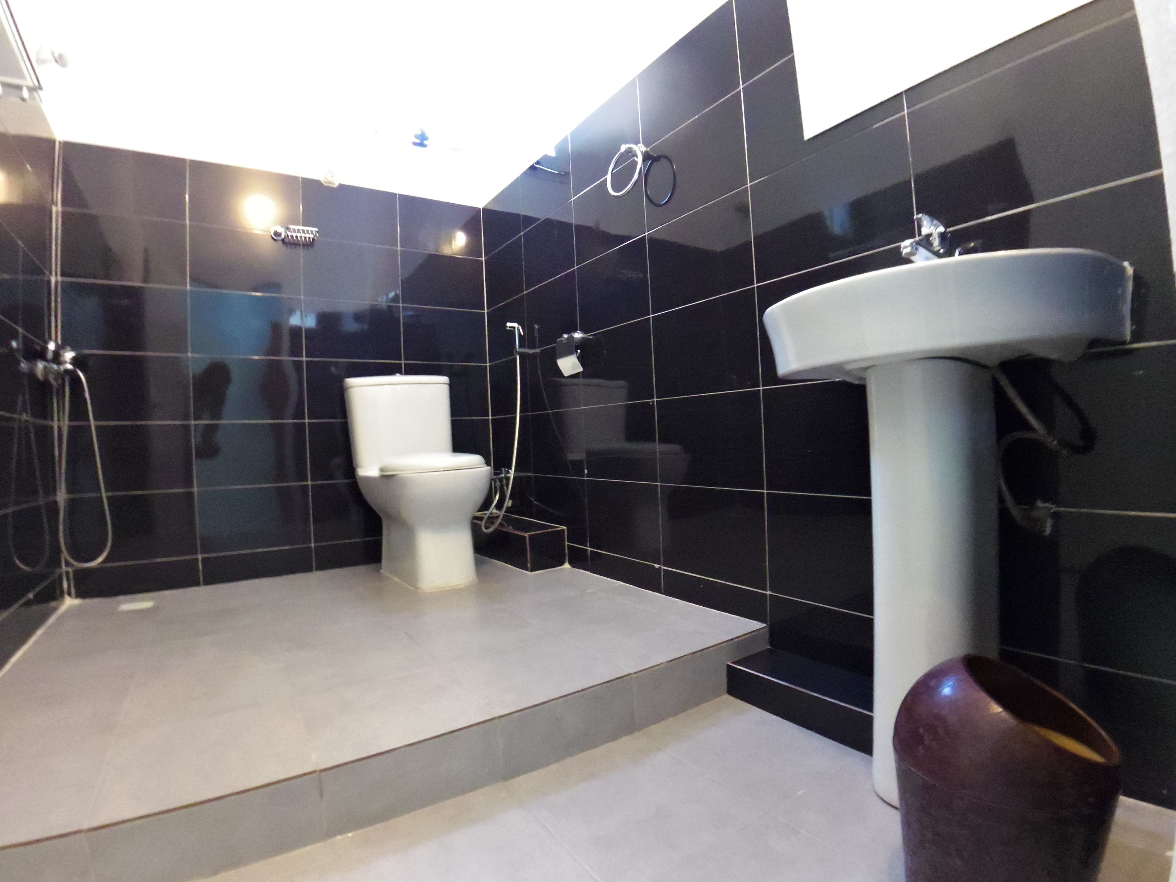 Shower, rainfall showerhead, hair dryer, towels