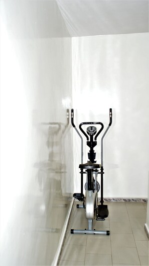 Shower, rainfall showerhead, hair dryer, towels