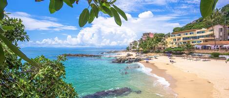 On the beach, sun-loungers, beach towels