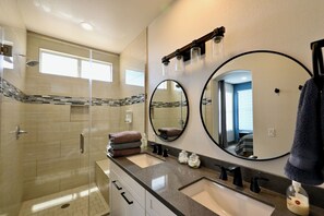 Hair dryer, towels, shampoo, toilet paper