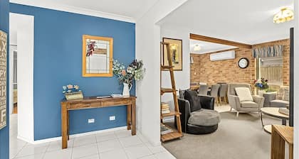 Floreat is a luxurious four bedroom Sawtell home, perfect for the family getaway near the beach.