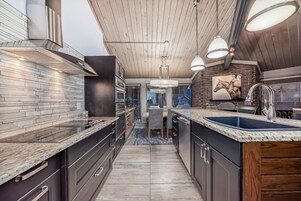 Cavell Penthouse Suite | Private kitchen | Fridge, coffee/tea maker, electric kettle