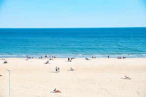 On the beach, sun loungers, beach towels
