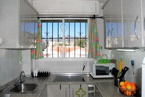 Fridge, microwave, coffee/tea maker, electric kettle