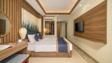 Habitación doble Deluxe, aire acondicionado, vista a la ciudad | Minibar, caja de seguridad en la habitación y muebles diferentes