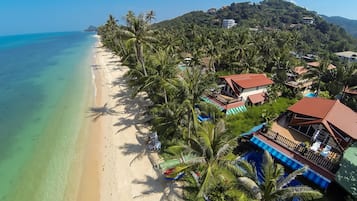 Na praia, toalhas de praia