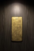 A gold-colored directory listing hotel rooms and amenities, including guest rooms, a rooftop terrace, a laundry, a lobby, a ball room, a banquet, and a bar.