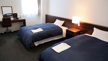 Chambre avec lits jumeaux, non-fumeurs | Bureau, fer et planche à repasser, Wi-Fi gratuit