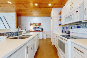 Fridge, microwave, dishwasher, coffee/tea maker