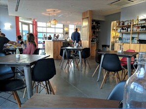 Enjoy dining at this stylish eatery with comfortable seating and a welcoming atmosphere.