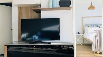 Deluxe Apartment, 1 Bedroom | Living area | LED TV, Netflix