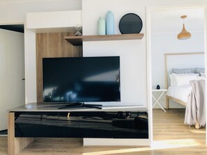 Appartement Deluxe, 1 chambre | Aire de séjour | Téléviseur à DEL, Netflix