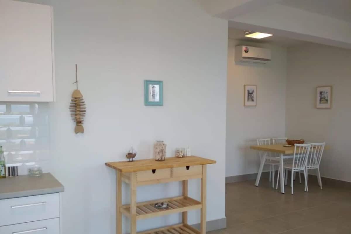 Apartamento, 2 quartos, vista para o mar (Almond) | Área de estar | TV de tela plana