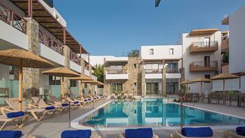 2 outdoor pools, pool umbrellas, pool loungers