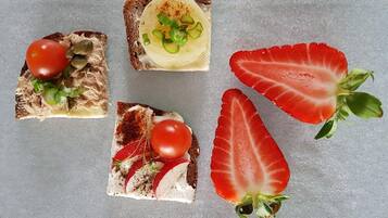 Four different food items on a flat surface.