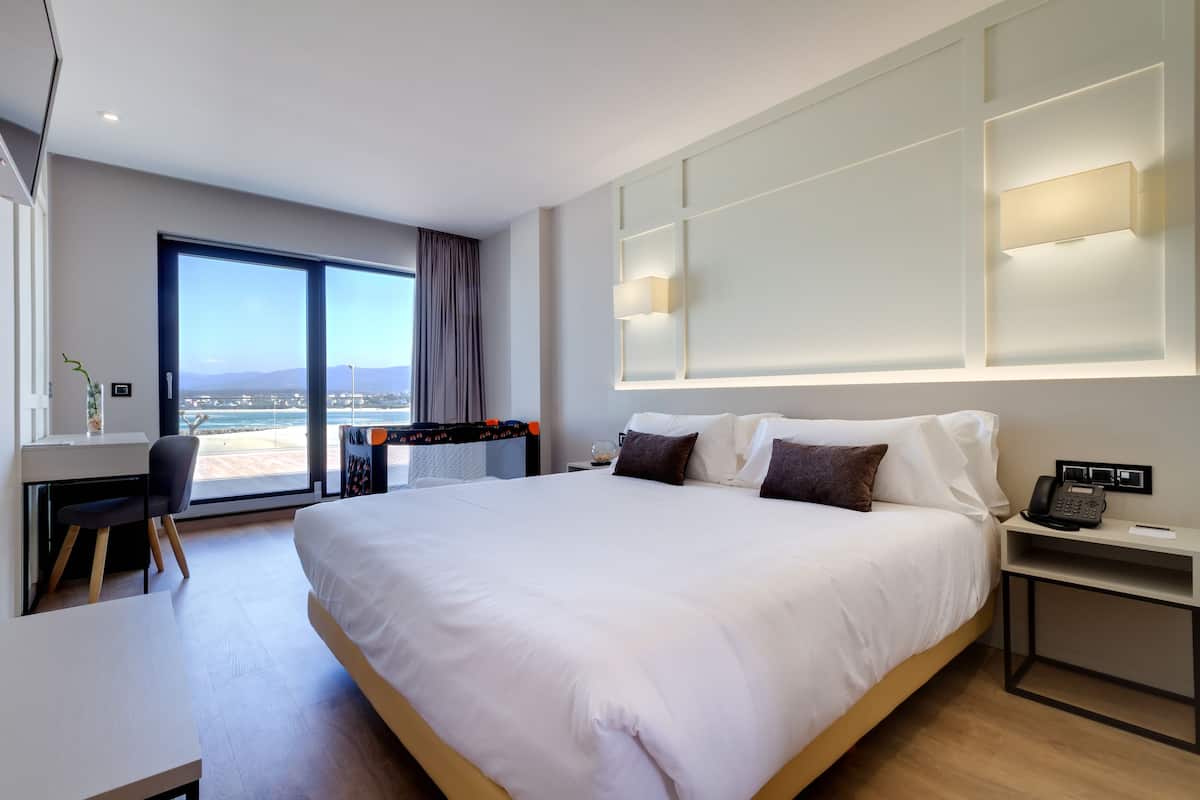 double or twin room, terrace | minibar, in-room safe, desk, laptop workspace