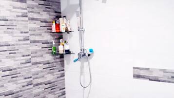 Luxury Double Room, 1 King Bed | Bathroom | Shower, free toiletries, slippers