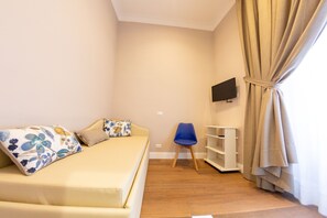 Suite familiar, 2 dormitoris | Roba de llit d'alta qualitat i caixa forta a l'habitació 