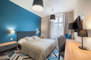 Habitación Deluxe doble | Sistema de insonorización, tabla de planchar con plancha, wifi gratis
