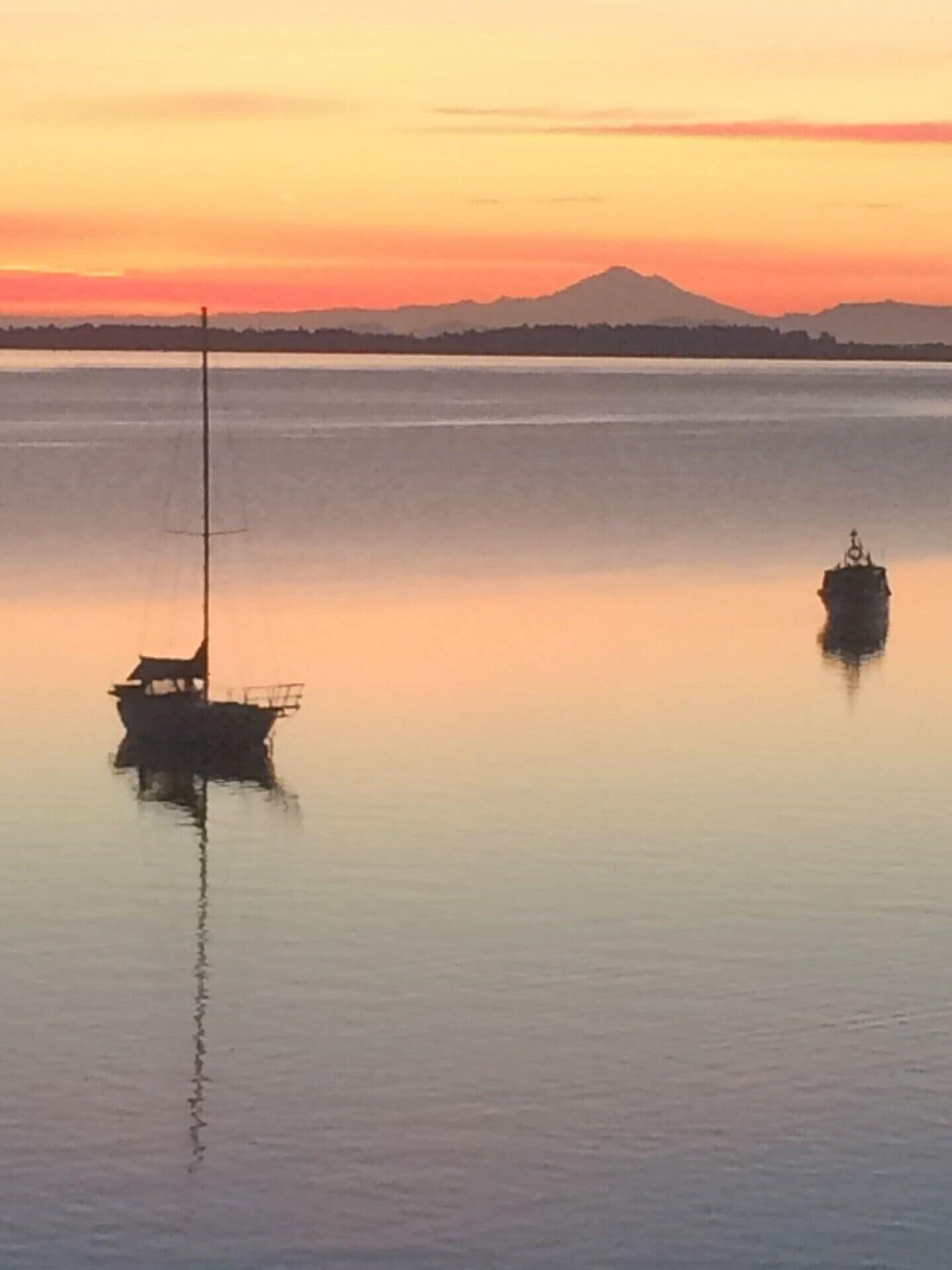 Mill Bay Moments view of sunrise over Mount Baker