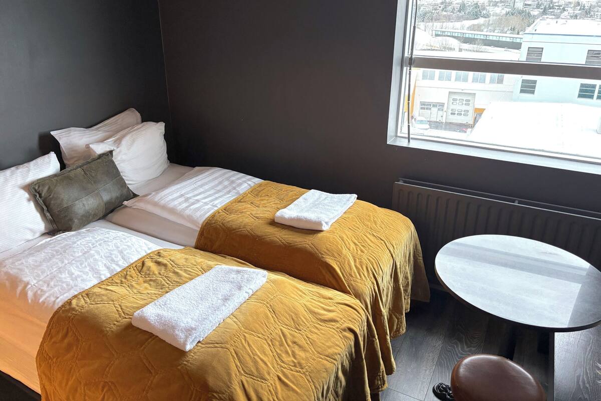 经济开间 | 笔记本电脑工作区、遮光窗帘、免费 WiFi、床单