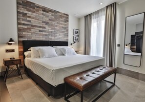 1 chambre, coffres-forts dans les chambres, fer et planche à repasser