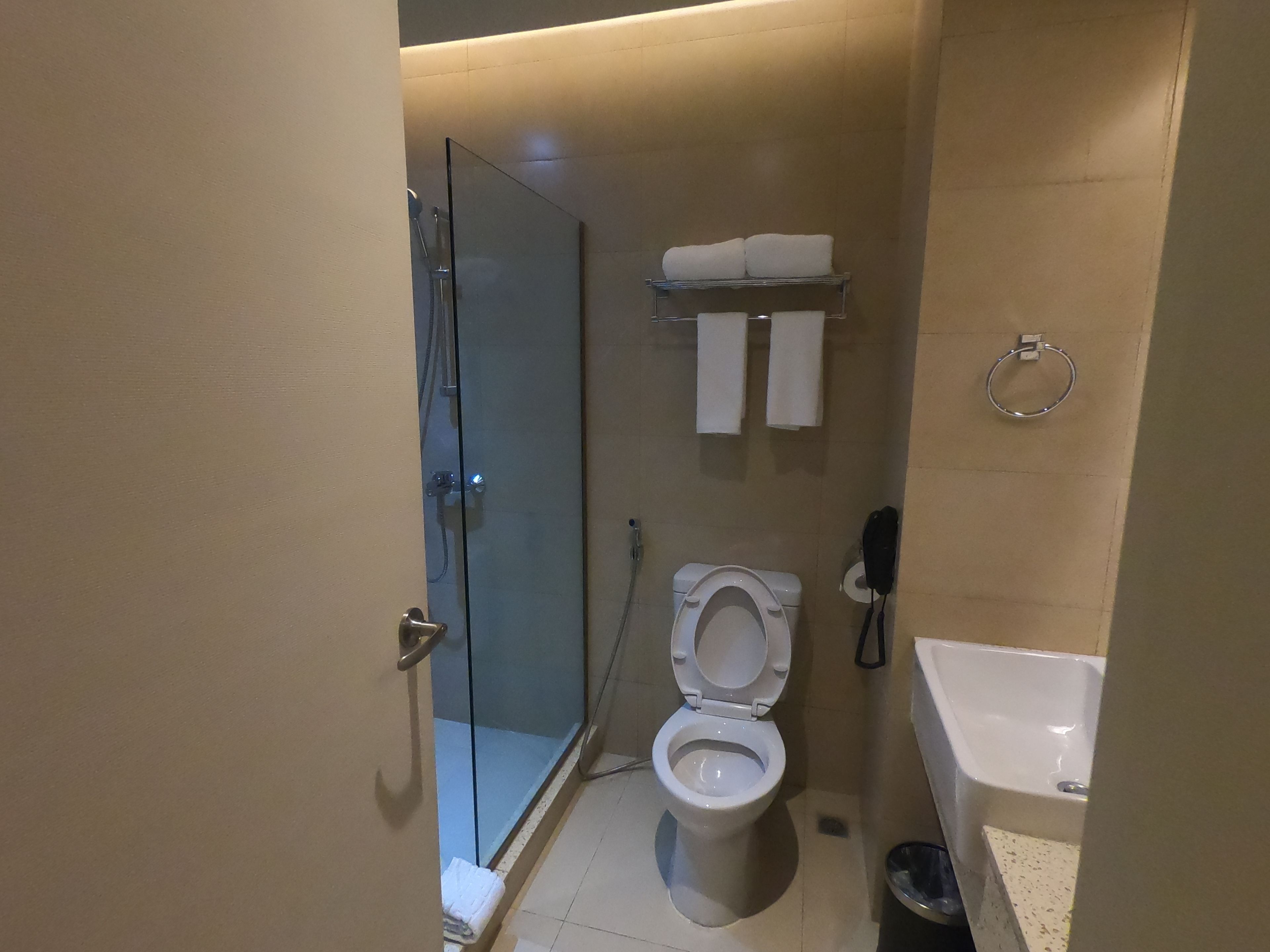 deluxe double room, 2 double beds | bathroom | hair dryer, slippers, bidet, towels