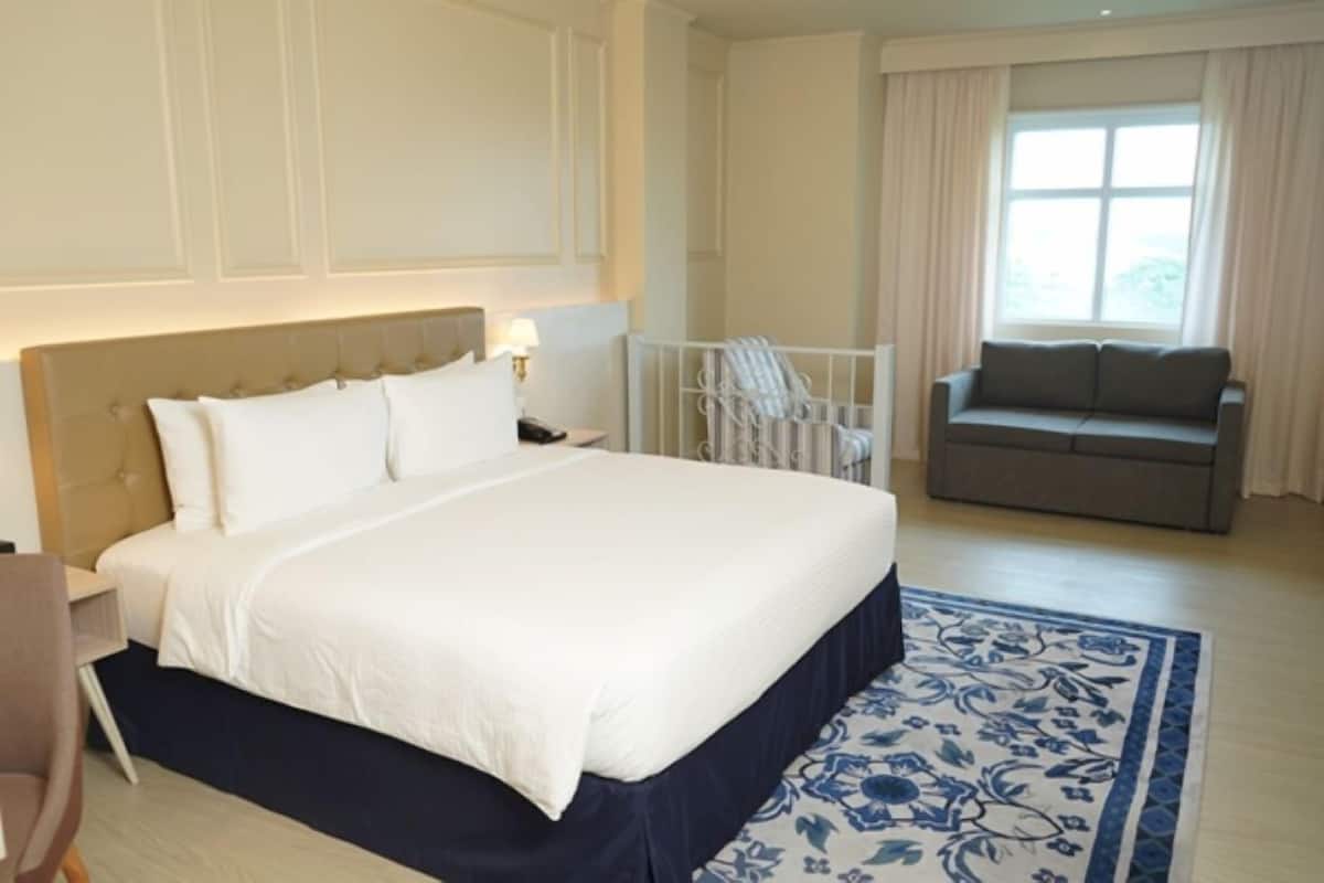 Suite junior | 1 habitación, ropa de cama de alta calidad y camas con pillow-top