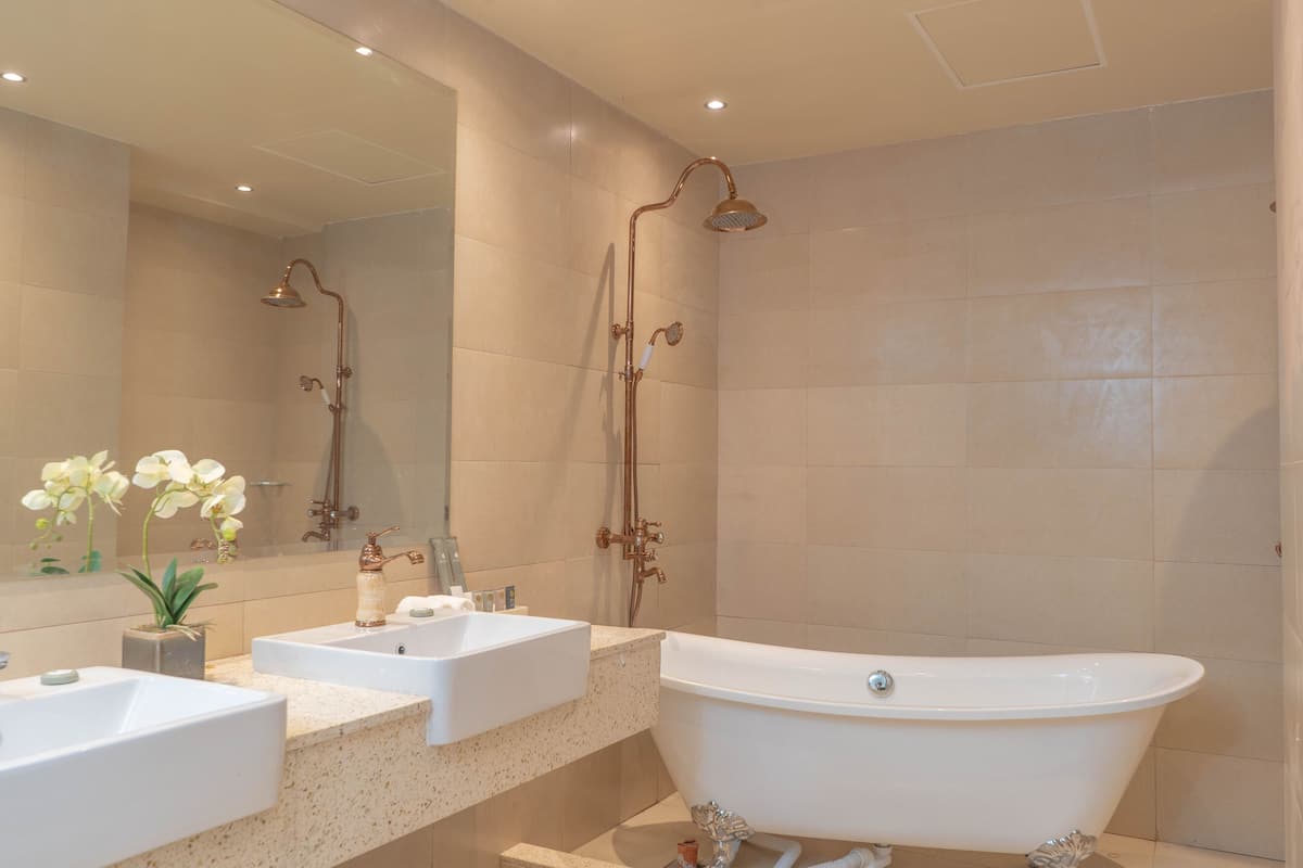 presidential suite, 1 king bed | bathroom | hair dryer, slippers, bidet, towels