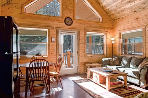 Waterfront cabin with bridge, private hot tub, & WiFi - near National Forest
