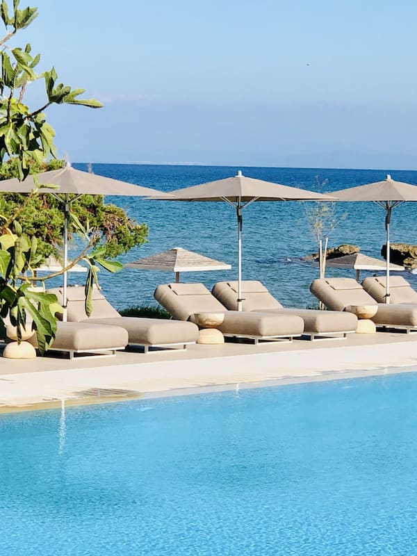 Outdoor pool, pool umbrellas, sun loungers