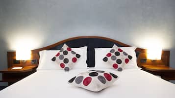 Standard Double Room | Minibar, in-room safe, desk, blackout drapes