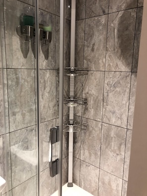 Shower, hydromassage showerhead, designer toiletries, hair dryer
