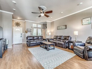 Smart TV, fireplace, books, stereo