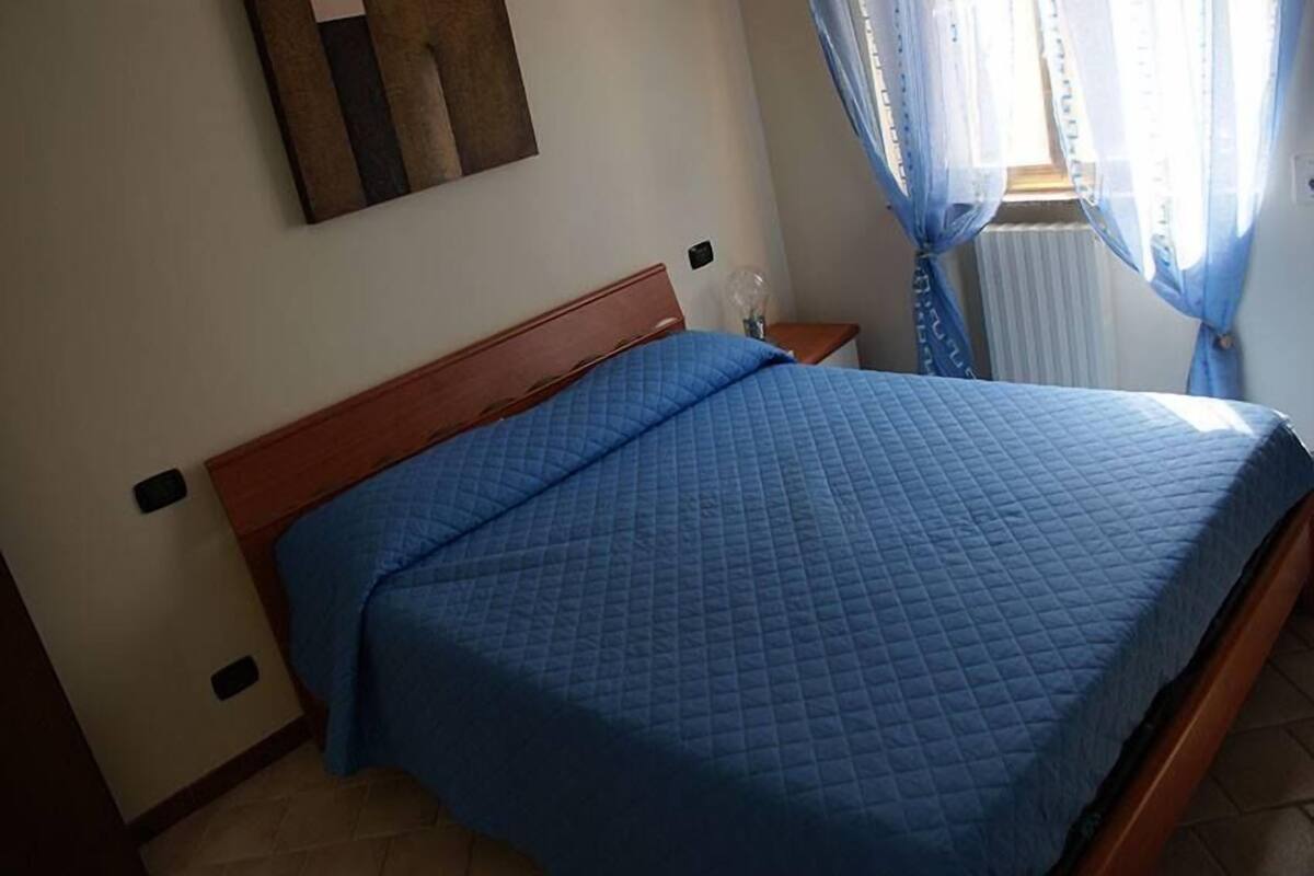 Desk, blackout curtains, soundproofing, rollaway beds