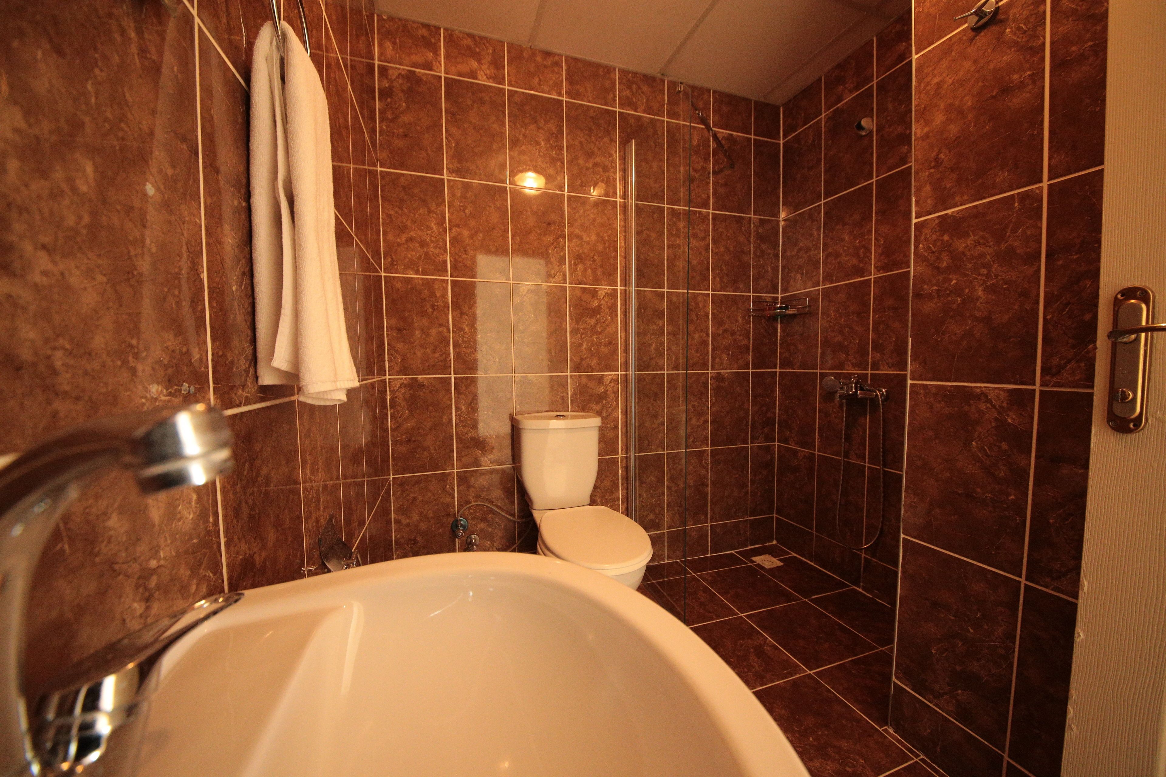 free toiletries, hair dryer, slippers, towels