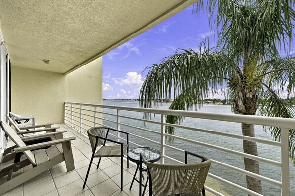 Enjoy morning coffee or evening drinks from your private waterfront balcony