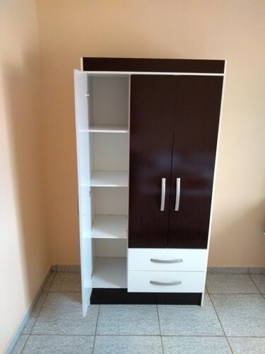 Room with double bed, bathroom and TV