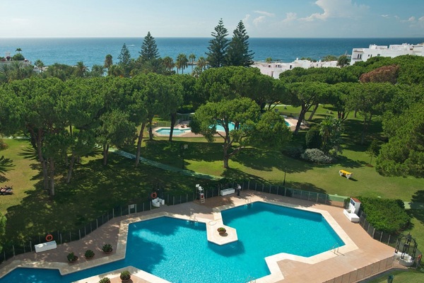 Partial aerial view of Club Playas Del Duque gardens and beach.