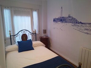 Standaard eenpersoonskamer | Luxe beddengoed, donsdekens, individueel gedecoreerd