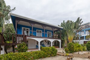 Exterior - Beachfront home with dock, deck, hammocks, strong WiFi, AC & sea view (Placencia)