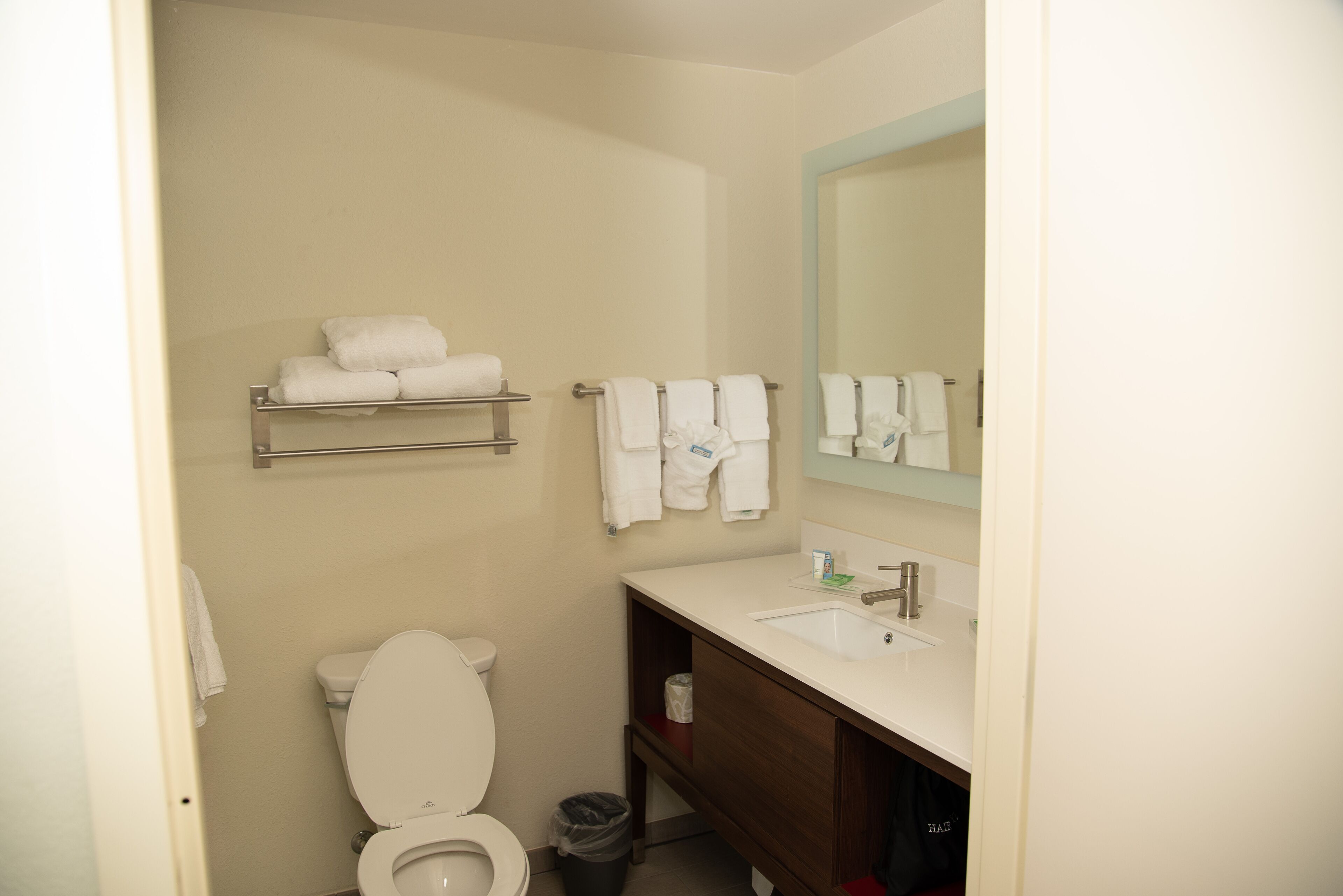 suite, 1 king bed | bathroom | rainfall showerhead, free toiletries, hair dryer, towels