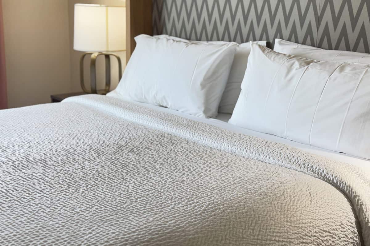 Down comforters, pillowtop beds, desk, blackout drapes