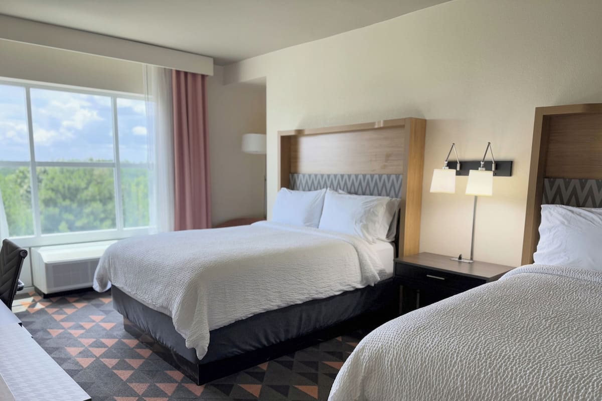 Down duvets, pillow-top beds, desk, blackout curtains