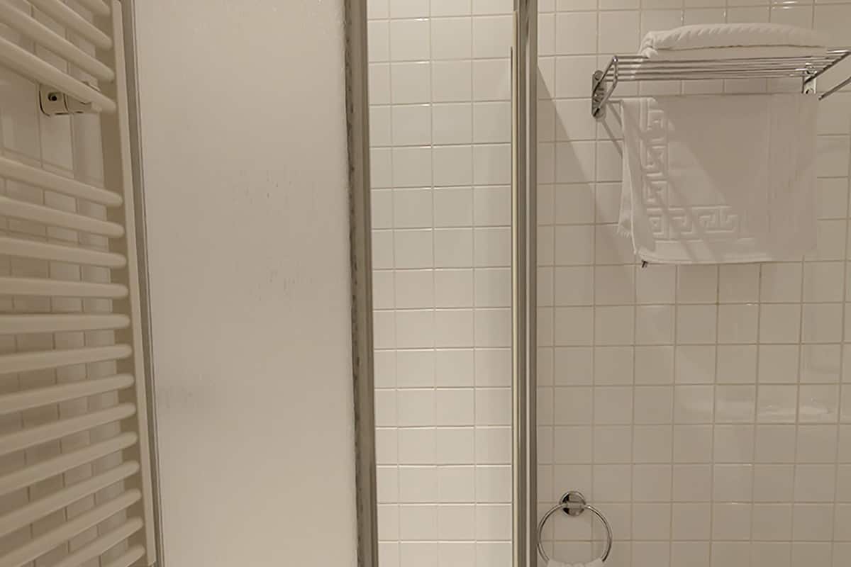 deep-soaking bathtub, rainfall showerhead, free toiletries, hair dryer