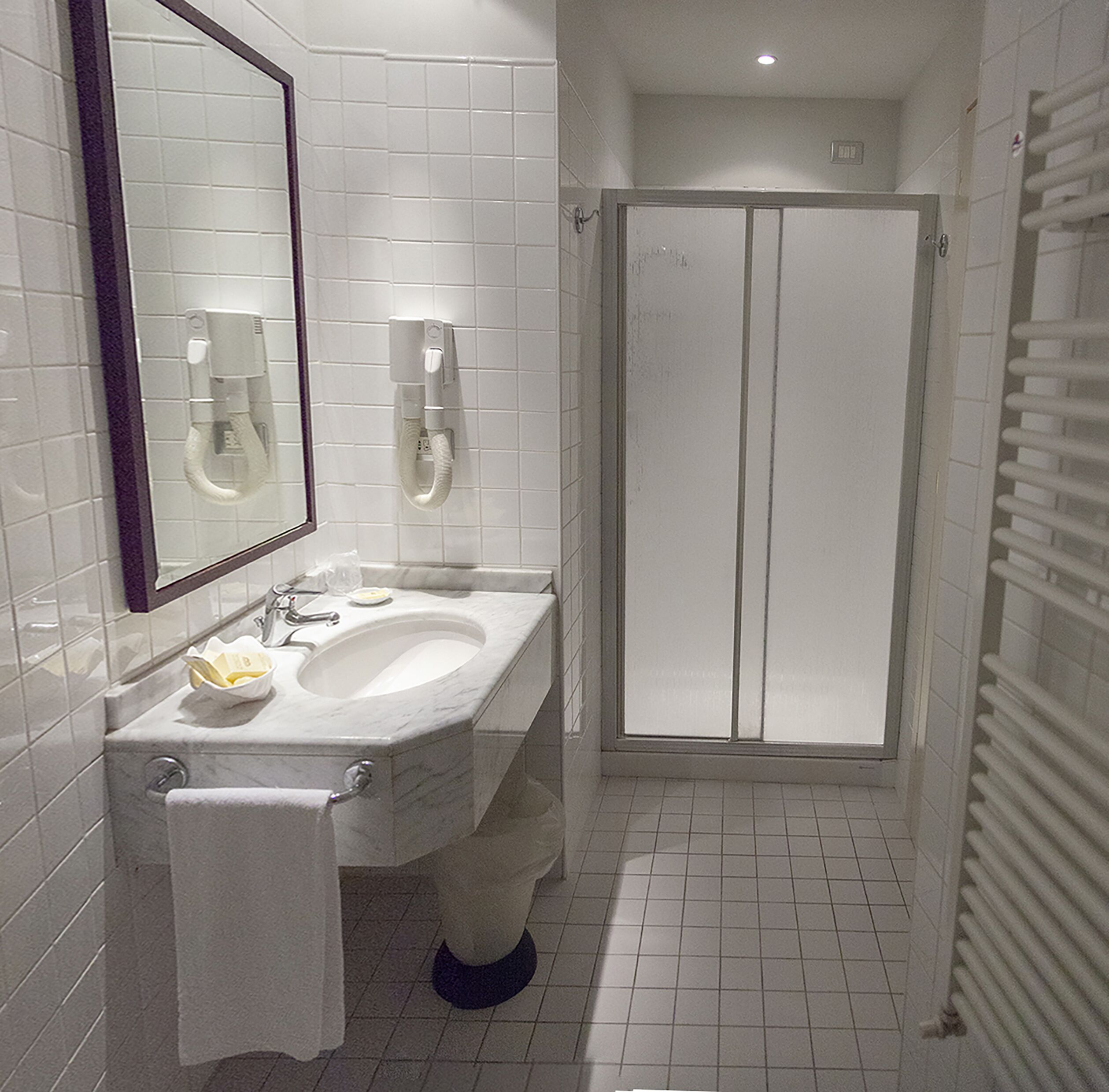 deep-soaking bathtub, rainfall showerhead, free toiletries, hair dryer