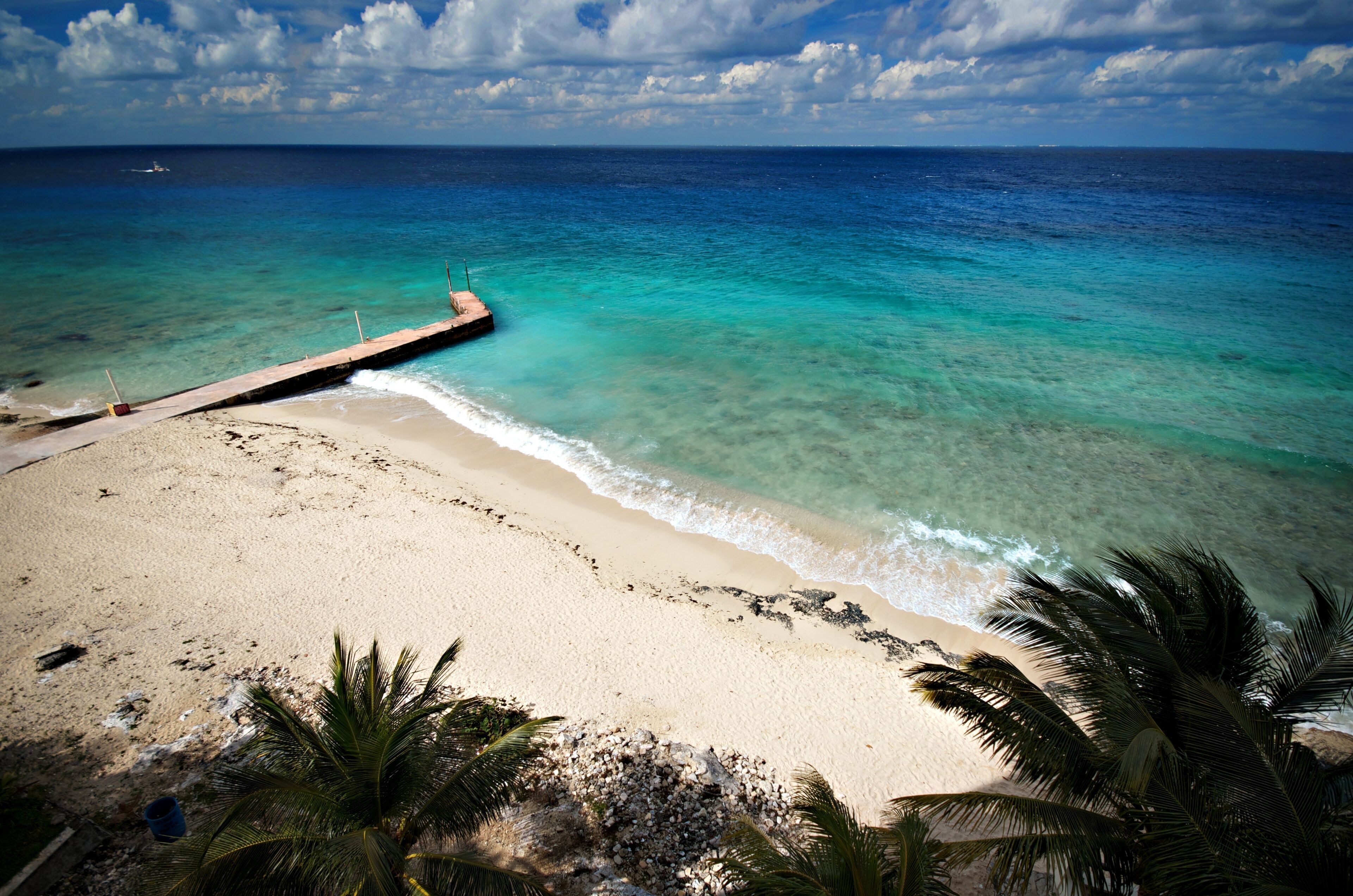 On the beach, sun-loungers, beach towels