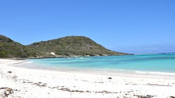 Beach nearby, sun loungers