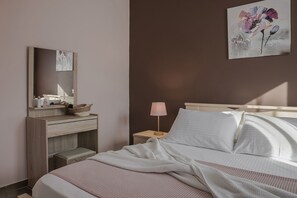 2 عدّة غرف نوم ومكواة/لوح كي وواي فاي مجانًا وملاءات أسرّة