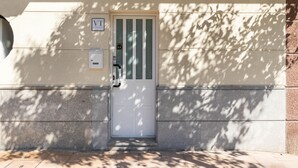 A door with a sign indicating a room number, a keypad, and a small window. - MUNDAKA HOME E-BI 260, With Good Access, Kitchen / Lounge / 2Hab. WIFI, PARKING. (Mundaka)